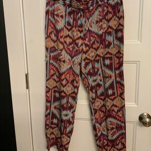 Pull on drawstring print pants with tapered leg from Anthropologie.